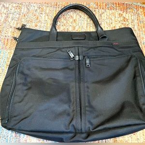 Tumi travel bag work office black new barely used overhead computer